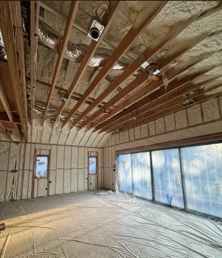 Interior walls and ceiling insulated with spray foam during new construction in Saranap